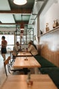 Group of young friends having lunch together in a bistro Royalty Free Stock Photo