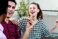 Group of young friends with pizza and bottles of drink Royalty Free Stock Photo