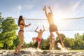 Group young Friends Playing Volleyball On Beach Royalty Free Stock Photo