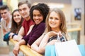 Group Of Young Friends Shopping In Mall Together Royalty Free Stock Photo