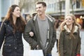 Group Of Young Friends Shopping Outdoors Together Royalty Free Stock Photo