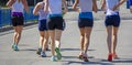 Group Young girls friends running on the street Royalty Free Stock Photo