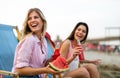 Group of young friends having fun at the beach on vacation party. People happiness concept Royalty Free Stock Photo