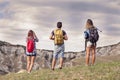 Group of young hikers in the mountain Royalty Free Stock Photo