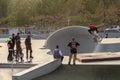 A group of young Iranians ride bicycles in a city skate park Royalty Free Stock Photo