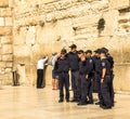 A group of young Israelis in police uniform are doing a picture in memory of the visit to the Wailing Wall Royalty Free Stock Photo