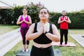 Group of young latin people meditating with closed eyes in the garden in Latin America Royalty Free Stock Photo