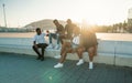 Group of young modern african black friends happily sitting together Royalty Free Stock Photo