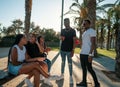 Group of young modern african black friends happily sitting together Royalty Free Stock Photo