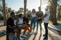 Group of young modern african black friends happily sitting together Royalty Free Stock Photo