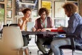 Group of young motivated employees working together