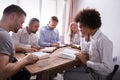 Group Of Young Multiethnic People Reading Bible