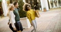 Young multiracial friends shopping in mall together Royalty Free Stock Photo