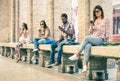 Group of young multiracial friends using smartphone Royalty Free Stock Photo