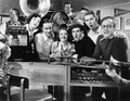 Group of young musicians performing in a music store Royalty Free Stock Photo