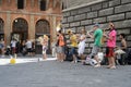 A group of young musicians playing on the street