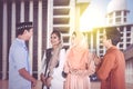 Young muslim people chatting together at mosque