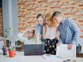 Office workers review plans and projects on the laptop