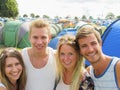 Group Of Young People Camping At Music Festival