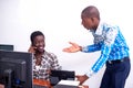 Group of young people with computer in an office Royalty Free Stock Photo