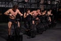 group of young people cycling in modern fitness bicycle during group spinning class Royalty Free Stock Photo