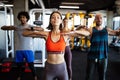 Group of young people doing exercises in gym Royalty Free Stock Photo