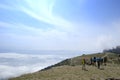 Group of young people doing trekking excursion in mountain's path - Hikers walking in nature outdoor - Survival