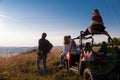 Group of young people driving a off road buggy car Royalty Free Stock Photo