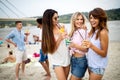 Group of young friends enjoying outdoor summer party Royalty Free Stock Photo