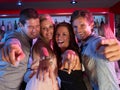 Group Of Young People Having Fun In Busy Bar Royalty Free Stock Photo