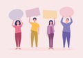 Group of young people holding empty speech bubbles. Royalty Free Stock Photo