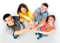 Group of young people holding hands Royalty Free Stock Photo