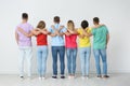 Group of young people hugging each other Royalty Free Stock Photo