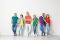 Group of young people in jeans and colorful t-shirts Royalty Free Stock Photo