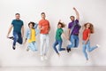 Group of young people in jeans and colorful t-shirts