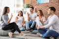 Group of young people learning sign language