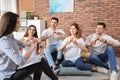 Group of young people learning sign language Royalty Free Stock Photo