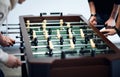 group of young people playing table football at office Royalty Free Stock Photo