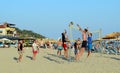 Group of young people playing volleyball on the beach in Nea Skioni, Halkidiki, Greece Royalty Free Stock Photo