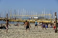 Group of young people playing volleyball