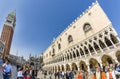 group of young people pose in front of san Marco church basilica at San Marco square in Venice, Italy Royalty Free Stock Photo