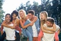 Group Of Young People Relaxing In Countryside