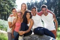 Group Of Young People Relaxing In Countryside