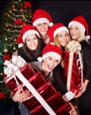 Group young people in santa hat at nightclub. Royalty Free Stock Photo