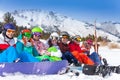 Group of young people with snowboards and goggles Royalty Free Stock Photo