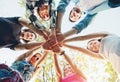 Group of young people standing in a circle, outdoors Royalty Free Stock Photo