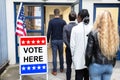 People Standing Outside Voting Room