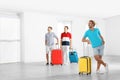 Group of young people with suitcases