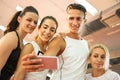 Group of young people taking a selfie photo in a gym Royalty Free Stock Photo