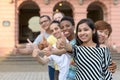 Group of young people with thumbs up Royalty Free Stock Photo